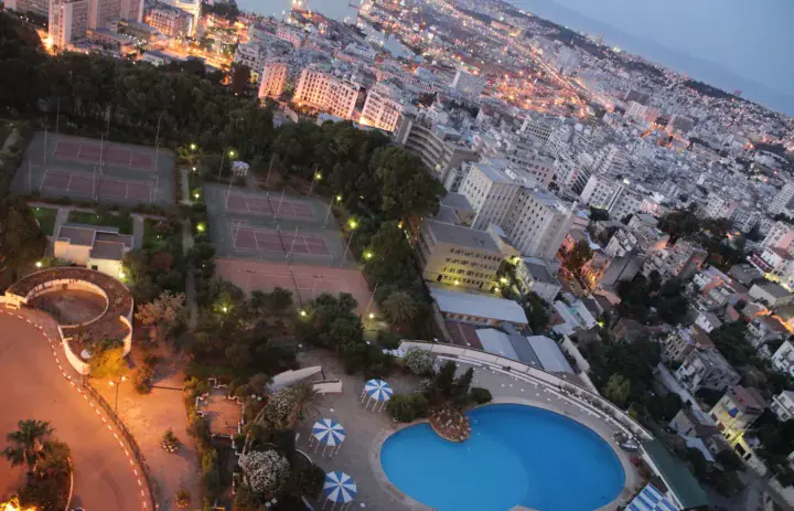 Algiers buildings and bay seen from the El Aurassi Hotel at dawn