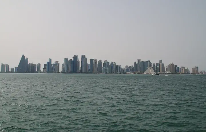 Doha's West Bay skyline seen across the water in Qatar
